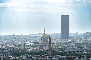 Panoramic view of Paris showcasing prominent landmarks including Tour Montparnasse and Les...
