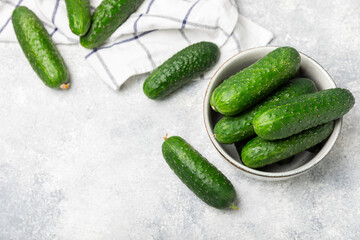 Cucumber on wooden background. Slice of cucumber on background. Fresh organic green cucumbers...