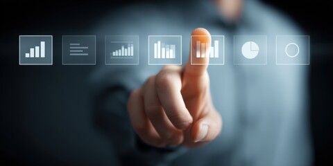 Human finger presses business analytics interface button, displaying data visualization and digital transformation.