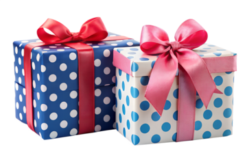 Two gift boxes with polka dots and ribbons isolated on transparent background, perfect for christmas, birthdays, or any special celebration, studio shot