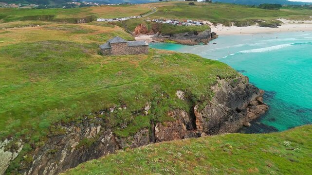 Aerial view of Playa de Santa Comba beach with turquoise sea in Galicia Spain