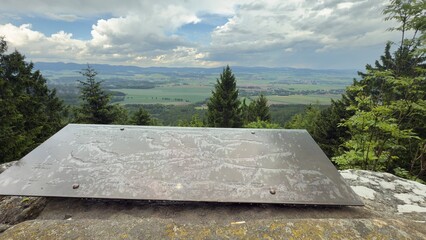 Hvezda Hill in the Broumov Walls, Czech Republic, overlooking the town of Broumov and the surrounding mountain ranges