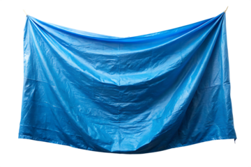 wrinkled blue tarp hanging on white background PNG.AI Generated