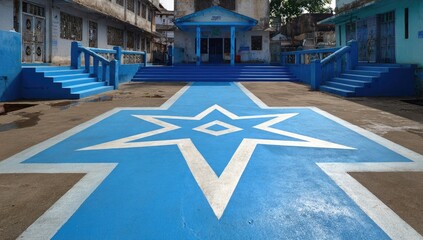 Blue painted star design on courtyard steps