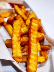 Crispy, golden-brown street fries straight from the fryer! This beloved snack, enjoyed globally, combines perfectly seasoned potatoes with that satisfying crunch.