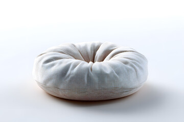 Soft round floor cushion in light fabric, designed for meditation, yoga, and relaxation spaces.