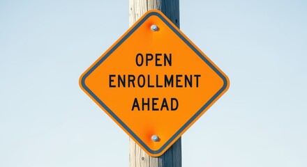 Open Enrollment Ahead Signage on Wooden Pole Against Blue Sky, Promoting Health and Benefit Choices