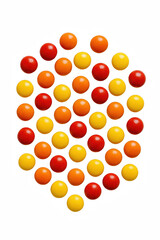 Vibrant Spheres Arranged in a Hexagonal Pattern, Showcasing a Playful Mix of Red, Orange, and Yellow Colors