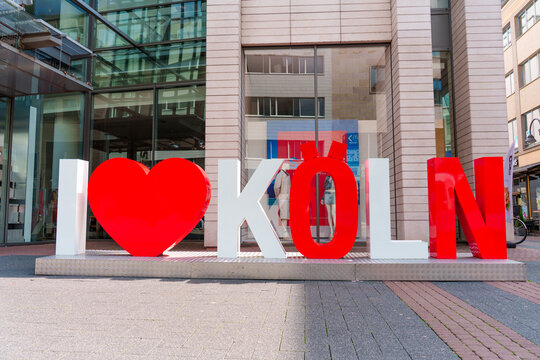 Cologne, Germany - June 15, 2025: Colorful I Love K&ouml;ln Sign in Urban Setting of Cologne Germany