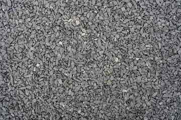 Gray gravel texture covering a construction site or landscape design