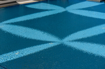 Rippled Water Reflecting Canopy Above Swimming Pool