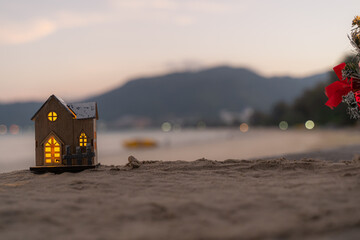 Cute and Christmas Tree House Relaxing on the Beach. Merry Christmas Holiday. Bright Background. Patong Beach, Phuket, Thailand.