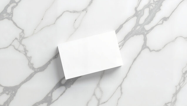 Blank business card on marble surface in modern style  