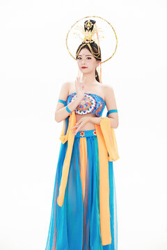 Chinese girls dressed in Tang Dynasty Dunhuang costumes dancing the flying apsaras dance