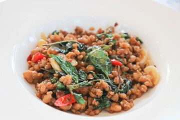 stir fried pork with sweet basil or stir fried ground pork or minced pork