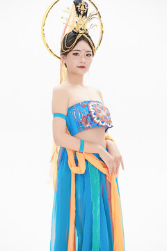 Chinese girls dressed in Tang Dynasty Dunhuang costumes dancing the flying apsaras dance