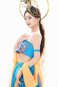 Chinese girls dressed in Tang Dynasty Dunhuang costumes dancing the flying apsaras dance
