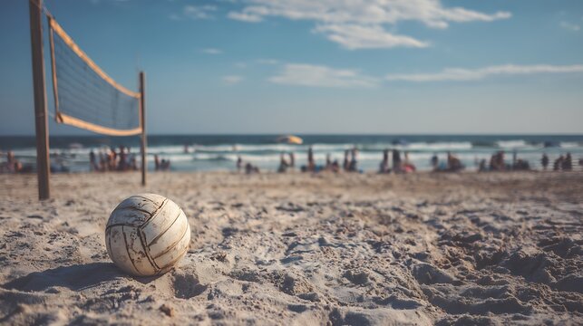 Sandy volleyball on beach ready for a sunny and active game day with friends .