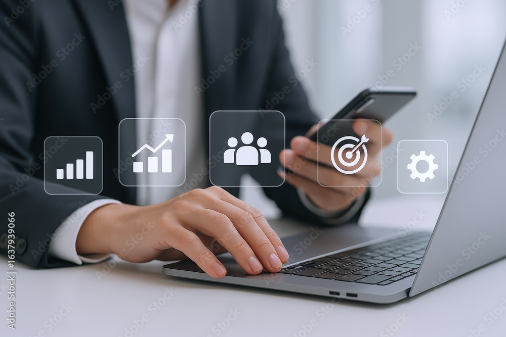 Aufkleber businessman analyzing data on laptop with mobile device and digital icons representing business stra