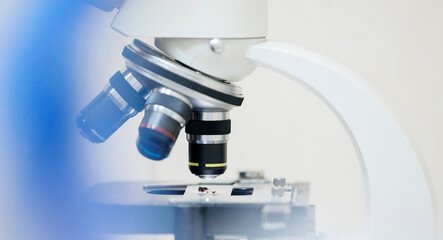 Close-up of microscope in veterinary clinic laboratory setting wax diagnostics for ear mites