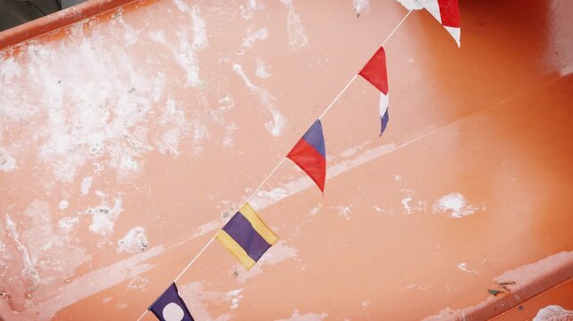 ICS flags on a boat blowing in the wind slow motion stock footage