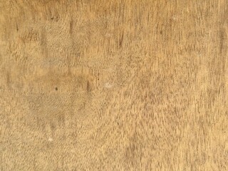 Brown wood board texture with natural grain. Wood texture for design and decoration. Minimalist natural wood pattern background for interior design and creative projects. Top view.