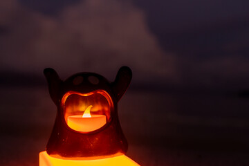 Concept: Halloween beach and ocean background with sea ghost with witch ghost fire, dark, scary tone.