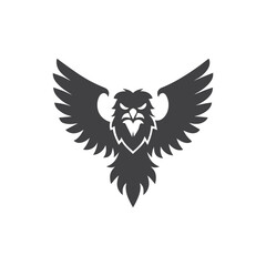 Obraz premium Fierce Eagle Emblem Silhouette with Wings Spread Wide on White Background hawk bird