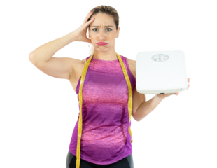 Middle aged sport woman holding bathroom scales with worried expression over transparent background
