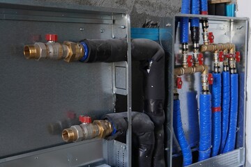 Installation of a water heating system in a house under construction. Modern plumbing and heating...