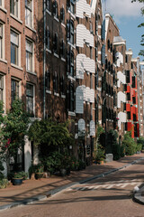 Fototapeta premium colourful old houses in the city of Amsterdam 