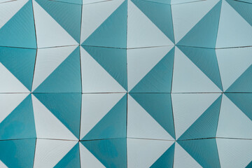 abstract background with blue and green triangles