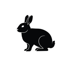 Black silhouette of a rabbit sitting on a white background