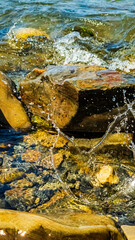 splash of water from a stone falling into the sea 