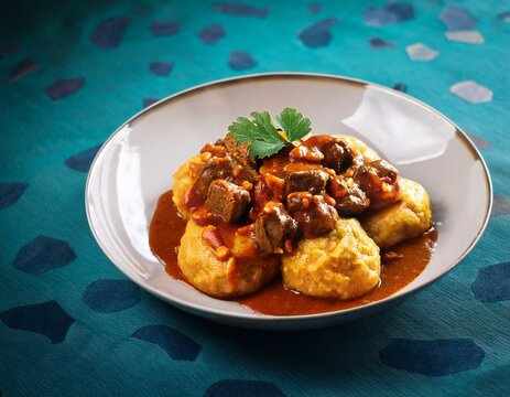 ugandan katogo matoke with beef and peanut sauce