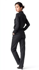 Stylish Asian Woman in Black Outfit Posing Against White Backdrop.