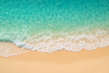 Tropical beach with turquoise waves and golden sand