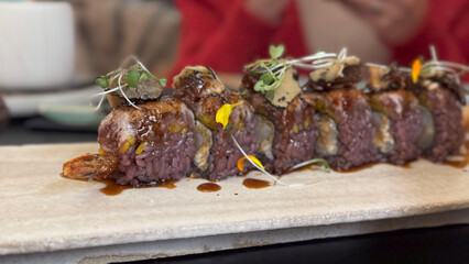 Grilled meat skewers in Spanish restaurant