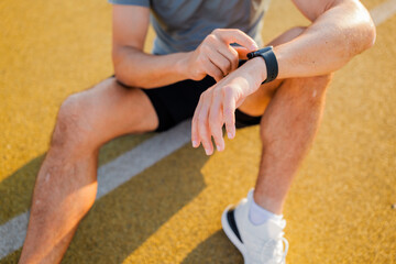 Engaging in fitness routines while tracking performance on a smartwatch during outdoor training