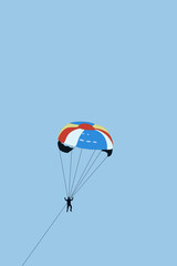 paragliding in the blue sky