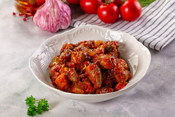 Roasted chicken hearts with vegetables