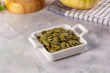 Fresh green pumpkin peeled seeds