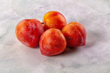 Ripe sweet juicy fresh purple plums