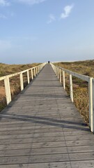 Fototapeta premium Wooden Boardwalk Along Atlantic Coast, Portugal