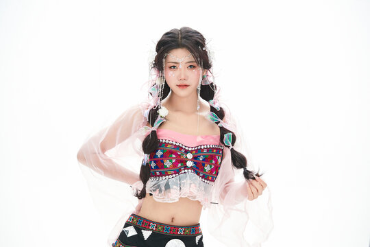 An Eastern girl dressed in the traditional costume of the Hani ethnic minority, which is popular among online influencers.