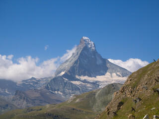 Zermatt, Switzerland - August 24th 2024: Untypical view to Matterhorn peak, seen from the hiking trail to Mettelhorn