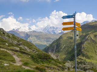 Mettelhorn, Switzerland - August 24th 2024: Hiking signs leading to the summit