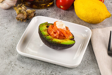 Whole grilled avocado with salmon