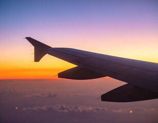 Obraz premium Airplane Wing At Sunset