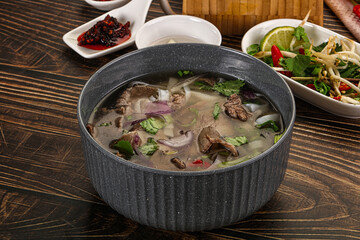 Vietnamese Pho Bo soup with beef and noodles